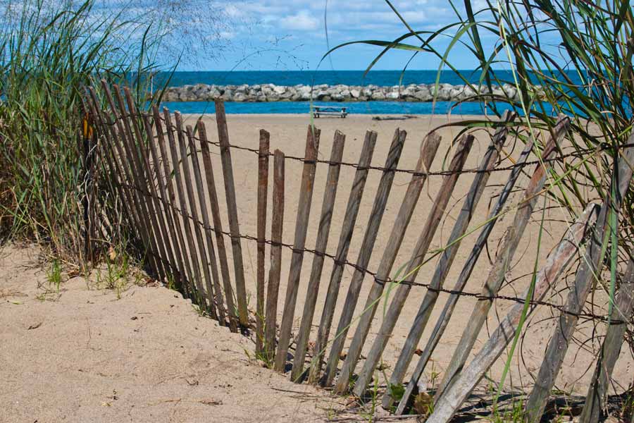 a wind break fence on the beach