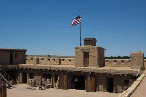 A view of the inside front of the fort from within. The American flag flies proudly in the center.