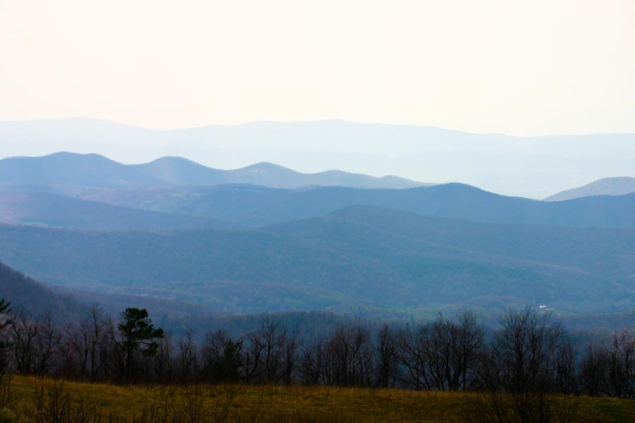 Layers of mountains fade off into the distance.