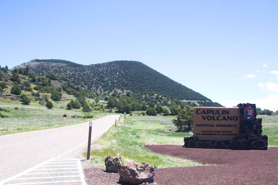 Capulin Volcano National Monument sign with volcano in background