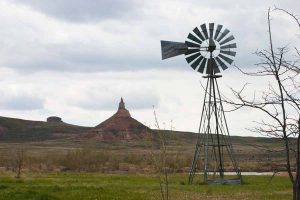 Chimney Rock with windmill in foreground