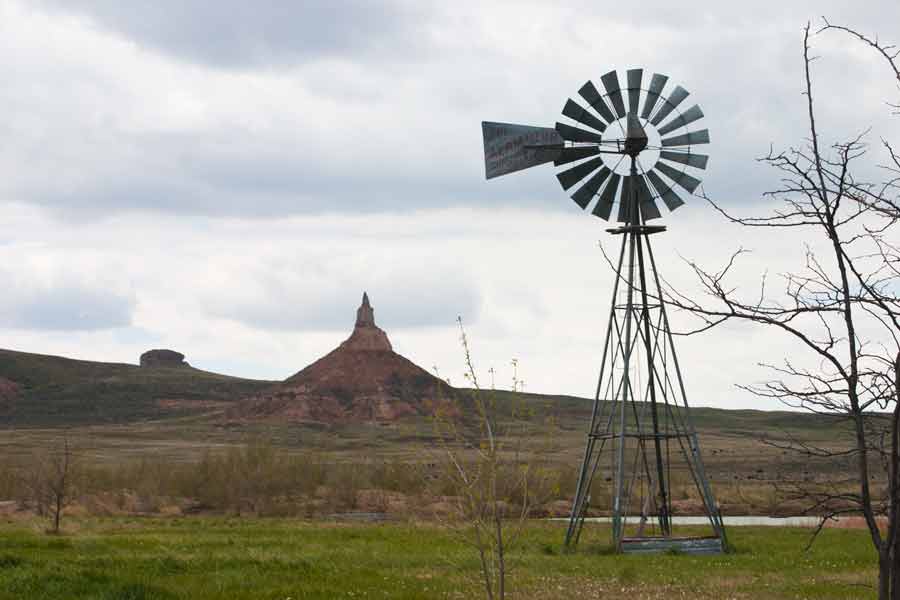Chimney Rock with windmill in foreground