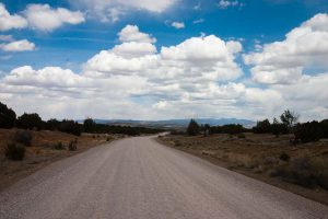 road beneath a beautiful cloudy sky