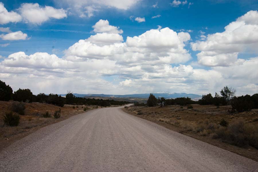 road beneath a beautiful cloudy sky