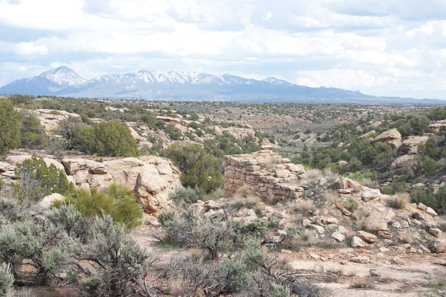 mountains in the background of ruins