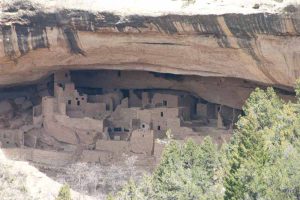 dwellings beneath a cliff