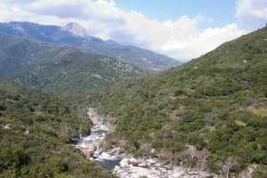 river flowing through mountains