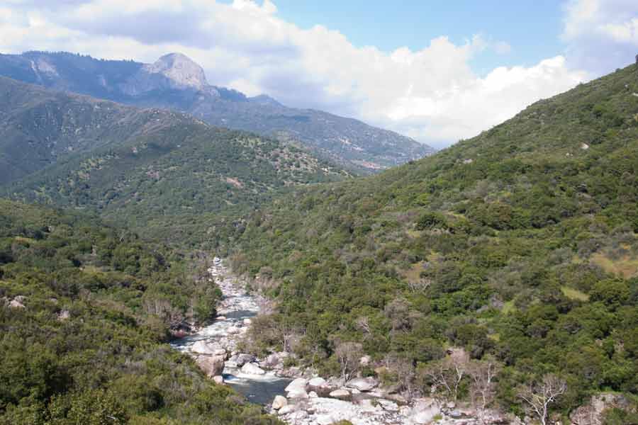 river flowing through mountains