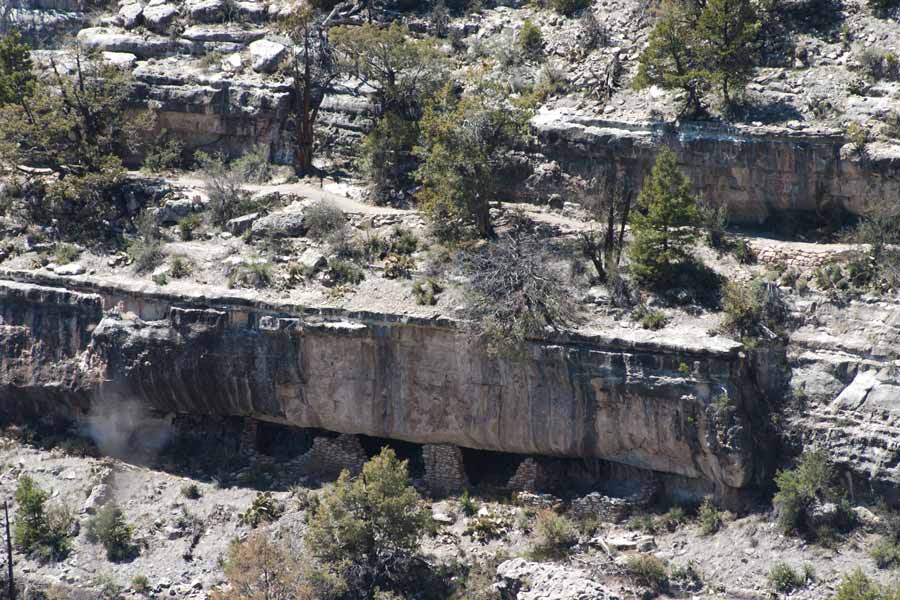 dwellings beneath a cliff