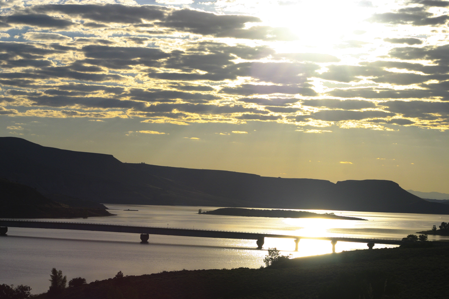 sunset reflects in the reservoir