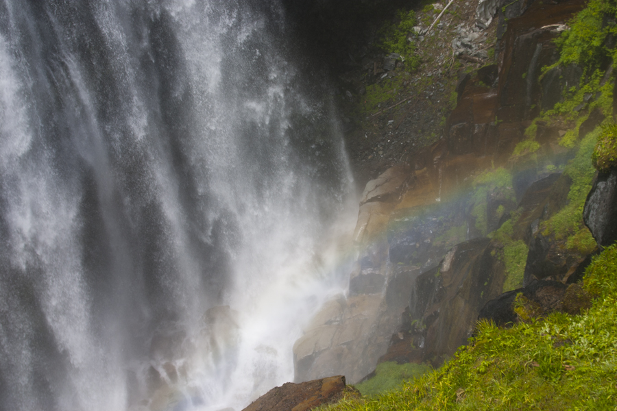 rainbow beside a waterfall