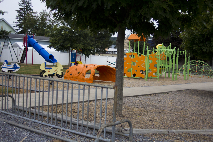 bike rack in front of playground