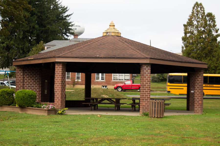 gazebo with two picnic tables