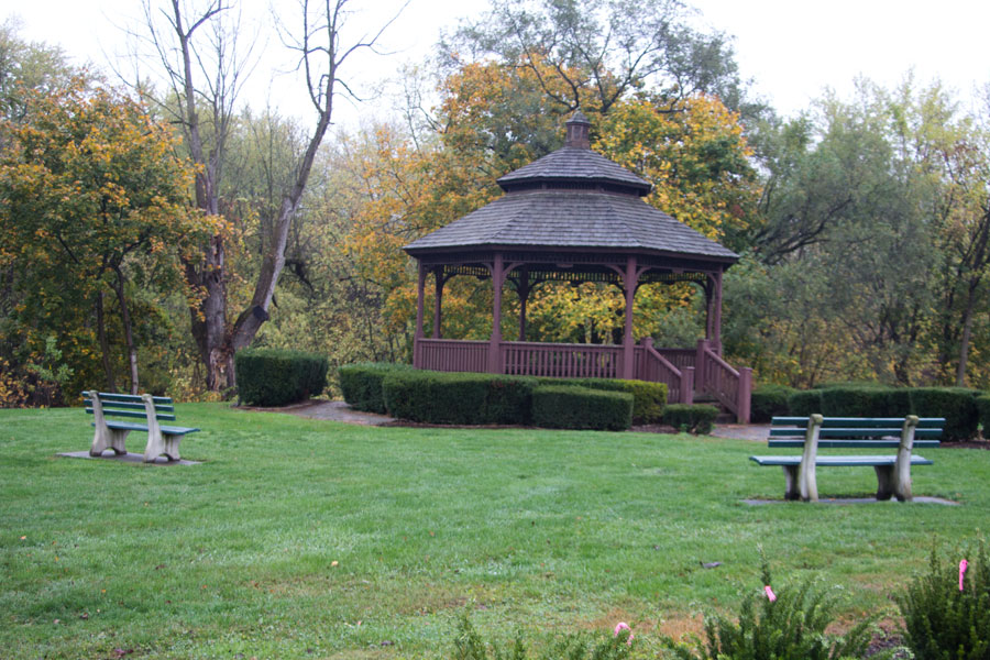 gazebo with benches facing it