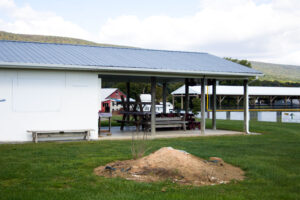 pavilion with picnic tables stacked up
