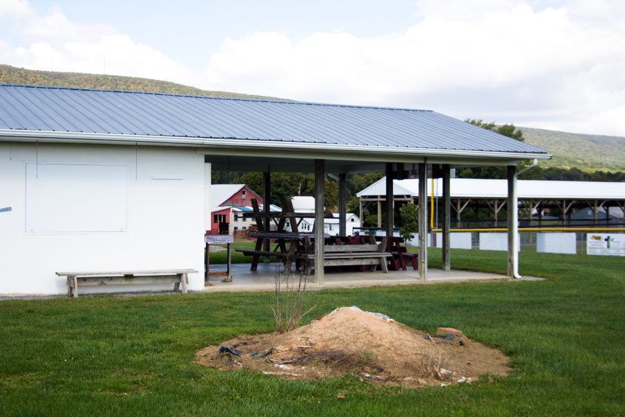 pavilion with picnic tables stacked up