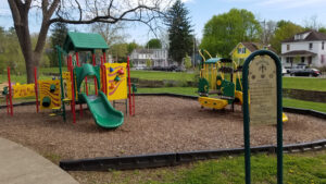 Kidsburg sign with playground