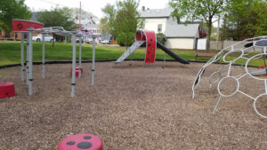red and silver section of playground