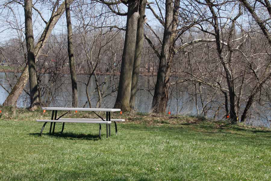 picnic table beside river