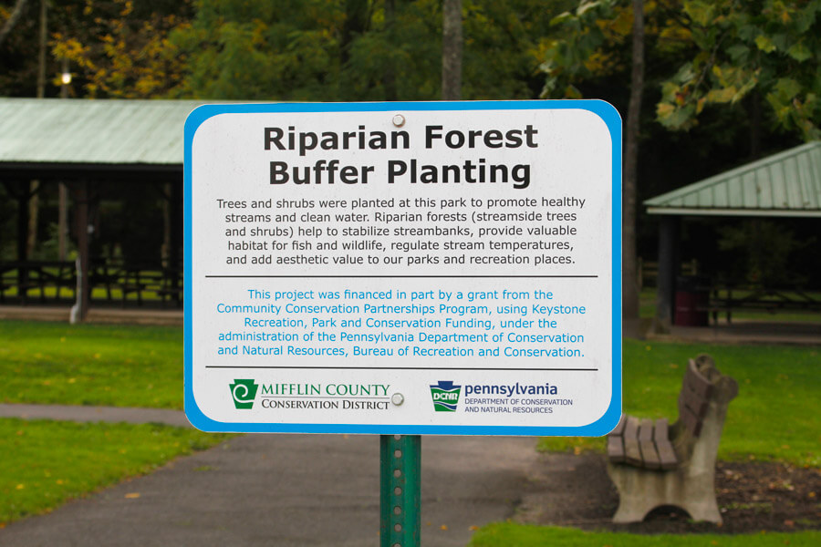 "Riparian Forest Buffer Planting" sign