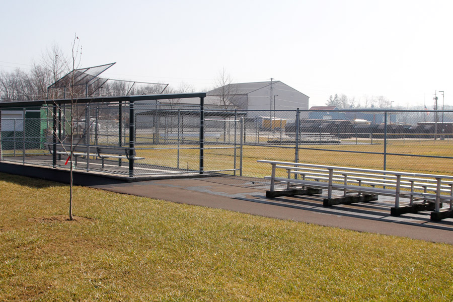 dugout, bleachers, and field