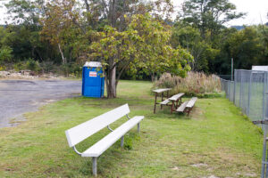 bench and three tiered bleachers