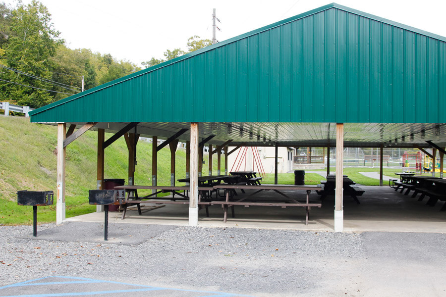 pavilion with picnic tables and grills