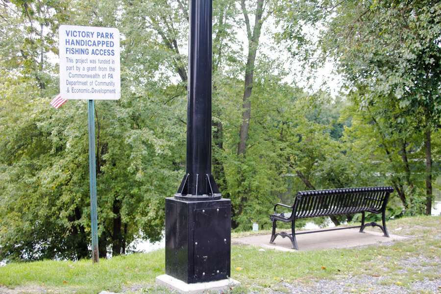 handicapped fishing access sign