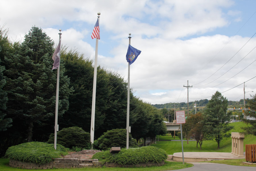 flags by the park entrance