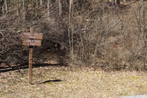 signs for two hiking trails