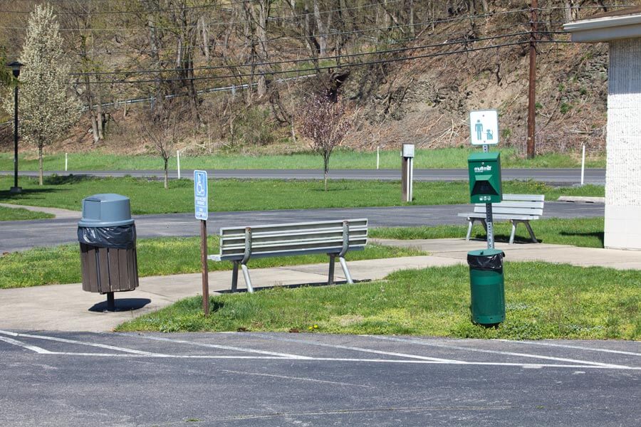 benches, pet waste bags, and a trash can
