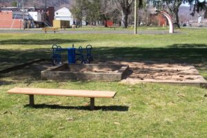 sandbox and a bench