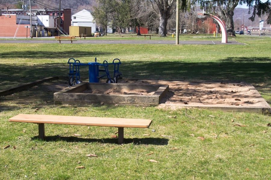 sandbox and a bench