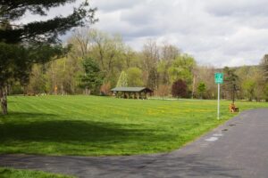 green space with a pavilion in the distance