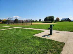 ball field and water fountain.