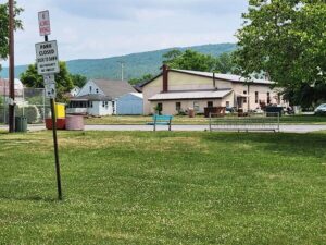 bike rack, basketball court, and green space.