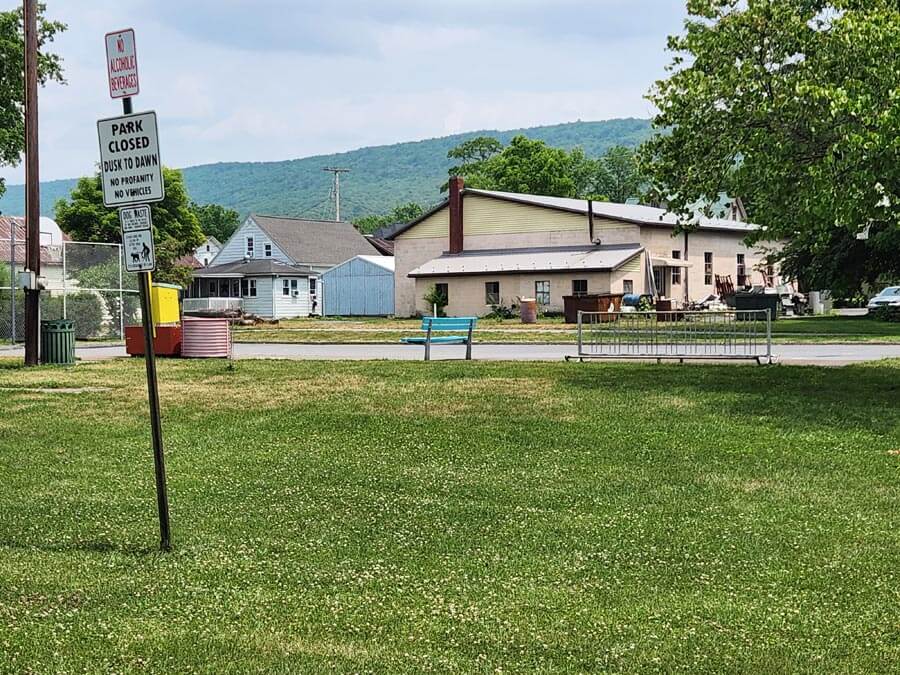 bike rack, basketball court, and green space.