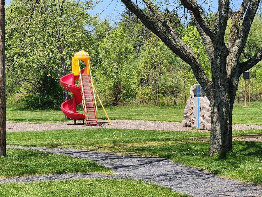 a twisty slide and a climbing wall.
