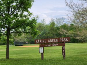 sign and ball field.