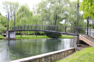 pedestrian bridge across river.