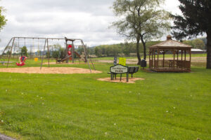sign, playground, and gazebo.