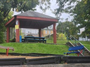 pavilion with a couple of picnic tables.