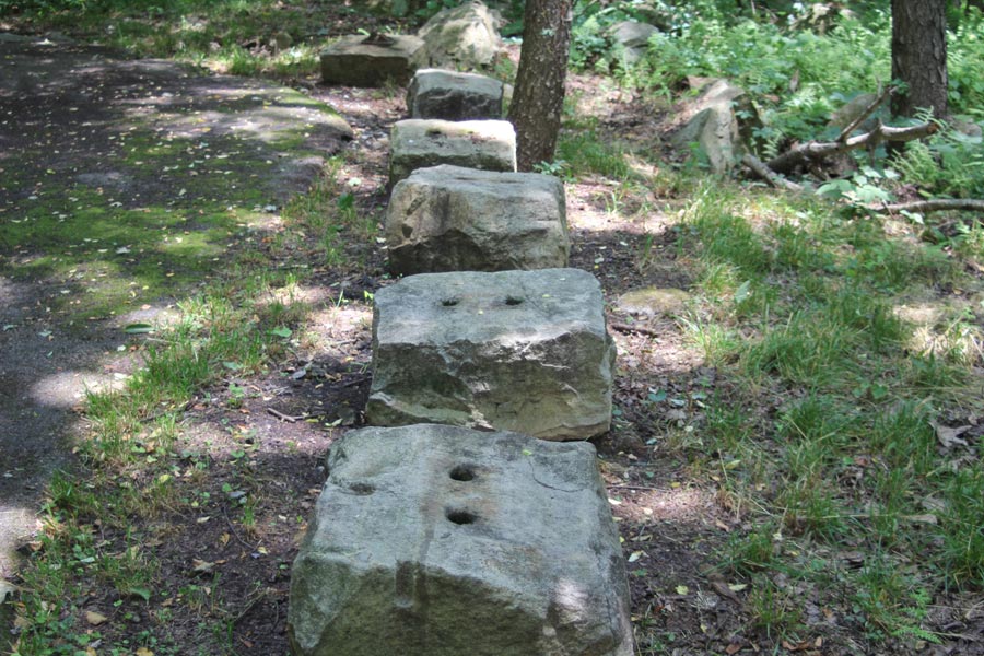stones with holes for railroad ties.