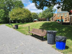bench along sidewalk.