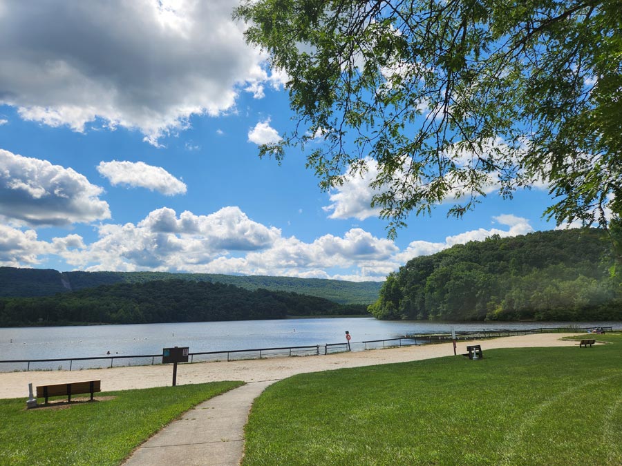 lake beach under a beautiful blue sky.