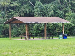 pavilion with two picnic tables.