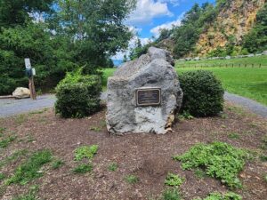 rock with a plaque.