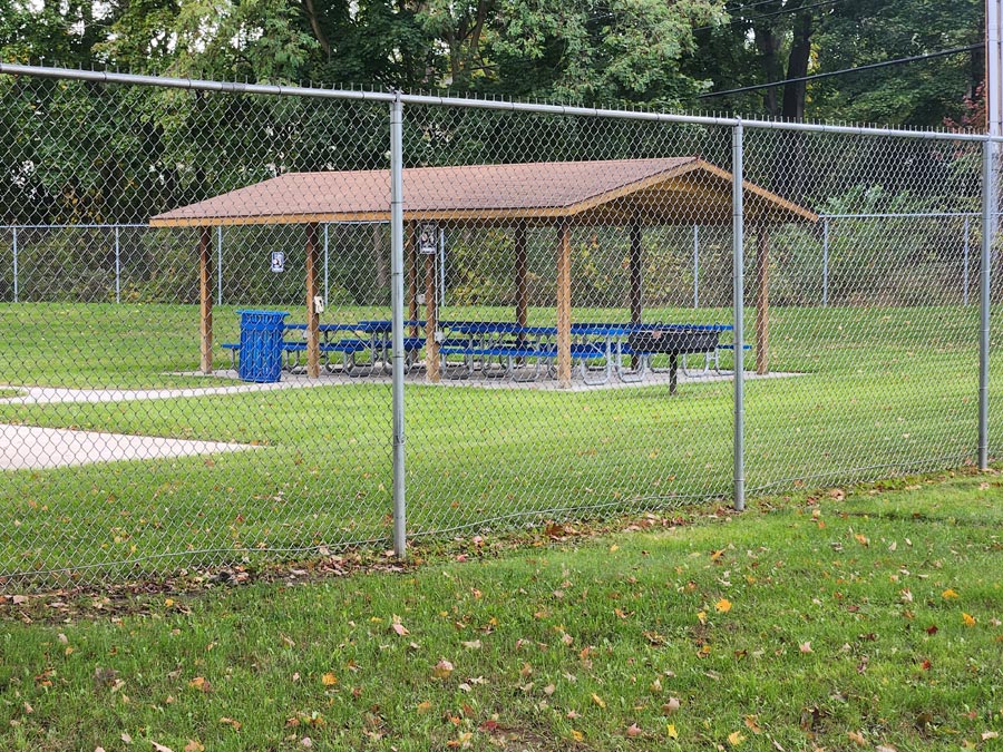 pavilion with picnnic tables.
