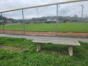 ball field with bench.
