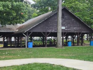 large pavilion with picnic tables.